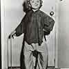 Shirley Temple imitating Charlie Chaplin during filming of Stowaway, 1936