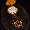 Gold pocket watch given to Titanic Harland and Wolff employee for his retirement, Titanic The Exhibition, Los Angeles, December 2023