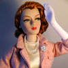 Photo of Ivy Jordan vinyl doll wearing Pink and Pearls