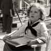 Shirley Temple doing schoolwork in between takes of “Captain January,” 1936
