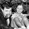 Shirley Temple in her backyard with Orson Welles, August 1939
