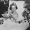 Shirley Temple, in bed sick during her cross country trip, 1938