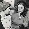 Mrs. Sidney Franklin and Shirley Temple at downtown L.A. restaurant before divorce hearing, December 5, 1949
