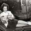 Shirley Temple at her Brentwood home reading Junior Miss, March 1942