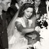 John Agar and Shirley Temple cutting wedding cake, September 19, 1945