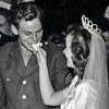 John Agar and Shirley Temple eating wedding cake, September 19, 1945