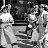 Disneyland King Arthur Carrousel photo with Rita Hayworth, daughter Yasmin, and Dick Hayme, July 25, 1955