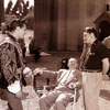 On set photo of John Derek in Prince of Pirates, 1953