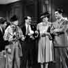 Chico Marx, Harpo Marx, Groucho Marx, Margaret Dumont, and Tony Martin in The Big Store, 1941