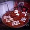 White Star Line Olympic second class dining room chair and smoking room table base with lions feet, Titanic The Exhibition, Los Angeles, December 2023