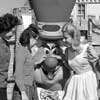 Alice in Wonderland and the Mad Hatter in front of the Sleeping Beauty Castle at Disneyland January 5, 1964