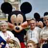 Mickey and Minnie Mouse at Disneyland entrance March 1960