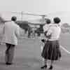 Audie Murphy and family at LAX, preparing to fly to the Disneyland Heliport, 1956