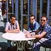 Guests smoking cigarettes, Fantasyland, 1950s