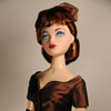 Photo of vinyl Gene Marshall doll wearing Cognac Evening