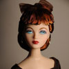 Photo of vinyl Gene Marshall doll wearing Cognac Evening