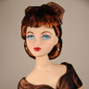 Photo of vinyl Gene Marshall doll wearing Cognac Evening