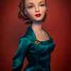 Photo of vinyl Gene Marshall Cocoa Crisp doll wearing Emerald Eve