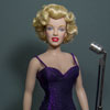 Marilyn Monroe doll wearing Entertaining The Troops Dress