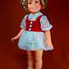 Shirley Temple Ideal vinyl 17 inch doll with velvet vest and flowered dress, 1972