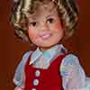 Shirley Temple Ideal vinyl 17 inch doll with velvet vest and flowered dress, 1972