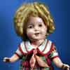 Shirley Temple 13 inch composition doll wearing Bright Eyes outfit