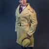 Photo of vinyl Trent Osborn doll wearing Tonner Dick Tracy