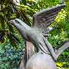 Haunted Mansion attraction queue bird sculpture