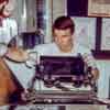 Disneyland East Main Street Steve Martin working the printing press in the Magic Shop