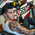 Daveland Robbie Bravo Bazzani at The El Rey Tattoo and Barber Shop photo