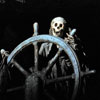 Disneyland POTC Pirate skeleton steering ship, July 2008