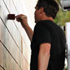 Shepard Fairey and crew painting a mural in South Park neighborhood of San Diego, July 15, 2010