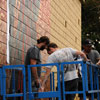 Shepard Fairey and crew painting a mural in South Park neighborhood of San Diego, July 15, 2010