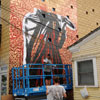 Shepard Fairey and crew painting a mural in South Park neighborhood of San Diego, July 15, 2010