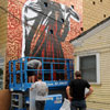 Shepard Fairey and crew painting a mural in South Park neighborhood of San Diego, July 15, 2010