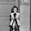 Shirley Temple in front of the Fox Studio Cafe de Paris, 1935