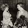 Shirley Temple and Claudette Colbert at the Oscars dinner in the Biltmore bowl, February 27, 1935