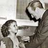 Shirley Temple 1939 'Susannah of the Mounties' on-set photo with Clem McCarthy