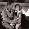 Shirley Temple and James Dunn in Bright Eyes photo, 1934