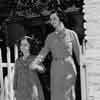 Shirley Temple with teacher Frances 'Klammie' Klamt during filming of 'Rebecca of Sunnybrook Farm,' 1938