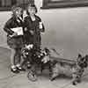 Shirley Temple and Marilyn Granas with Toto between scenes of Bright Eyes, 1934