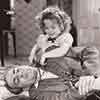 Shirley Temple and Ralf Harolde, Baby Take a Bow, 1934