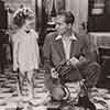 Shirley Temple and Ralf Harolde, Baby Take a Bow, 1934