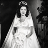 Shirley Temple modeling her wedding dress, September 19, 1945