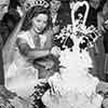 John Agar and Shirley Temple cutting wedding cake, September 19, 1945