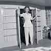 Shirley Temple at her glass block playhouse, 1943