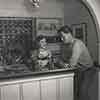 Shirley Temple and John Agar at home