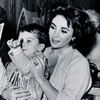 Disneyland Snow White's Scary Adventures attraction queue with Eddie Fisher, Elizabeth Taylor, and her sons Michael and Christopher, January 21, 1959 photo